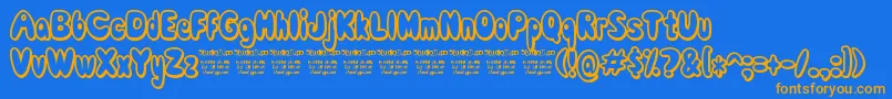 ComicWhiteRabbit Font – Orange Fonts on Blue Background