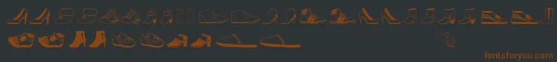 フォントWomenandshoes – 黒い背景に茶色のフォント