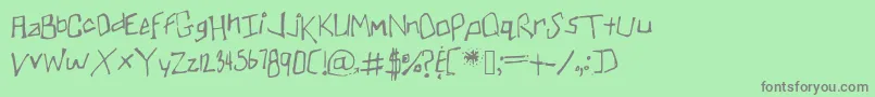 Skullmanator1 Font – Gray Fonts on Green Background