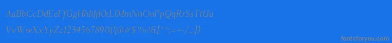 フォントTehutiItalic – 青い背景に灰色の文字