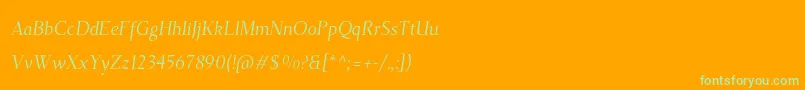 TehutiItalic-fontti – vihreät fontit oranssilla taustalla