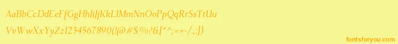 フォントTehutiItalic – オレンジの文字が黄色の背景にあります。