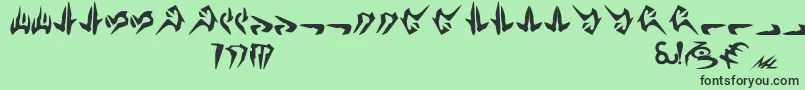 フォントNalHuttese – 緑の背景に黒い文字