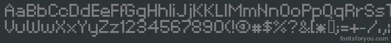 フォントXpaiderPixelExplosion02 – 黒い背景に灰色の文字