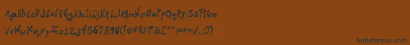 フォントAquanaut – 黒い文字が茶色の背景にあります