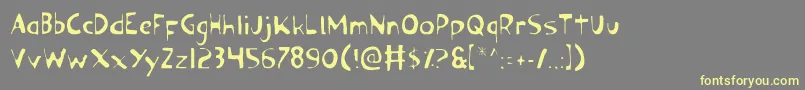 Ozyl Font – Yellow Fonts on Gray Background