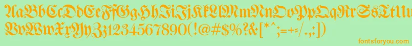 フォントWalbaumFrakturunz1 – オレンジの文字が緑の背景にあります。