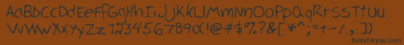 LukaRegular Font – Black Fonts on Brown Background