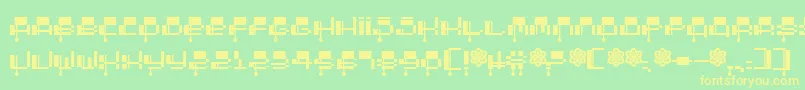 フォントOddessey2000 – 黄色の文字が緑の背景にあります