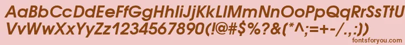 AvantgardegothicattBolditalic-fontti – ruskeat fontit vaaleanpunaisella taustalla