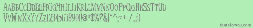 フォントDemonNi – 緑の背景に灰色の文字