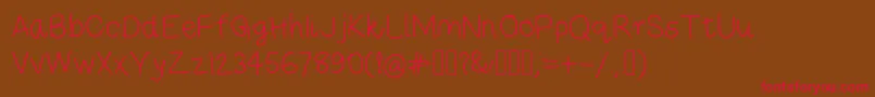 Risestarhandregular Font – Red Fonts on Brown Background