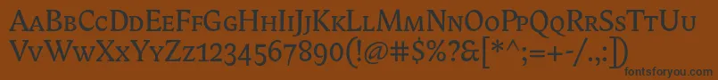 フォントBiblonitcsmallcaps – 黒い文字が茶色の背景にあります