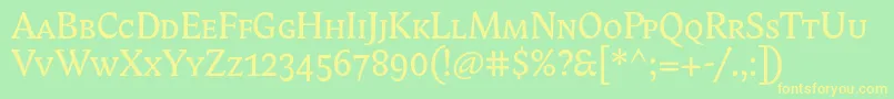 Biblonitcsmallcaps-Schriftart – Gelbe Schriften auf grünem Hintergrund