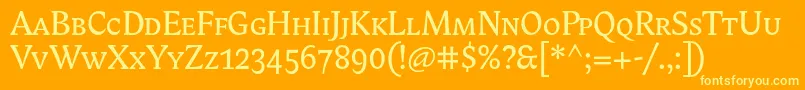 Czcionka Biblonitcsmallcaps – żółte czcionki na pomarańczowym tle