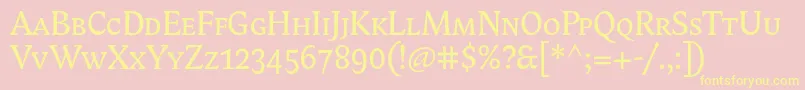 フォントBiblonitcsmallcaps – 黄色のフォント、ピンクの背景