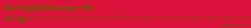 McfStarworms Font – Brown Fonts on Red Background
