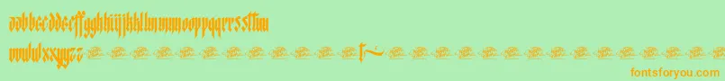 McfStarworms Font – Orange Fonts on Green Background
