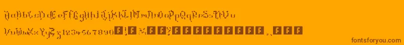 TheTerrifficKerganogggg-Schriftart – Braune Schriften auf orangefarbenem Hintergrund