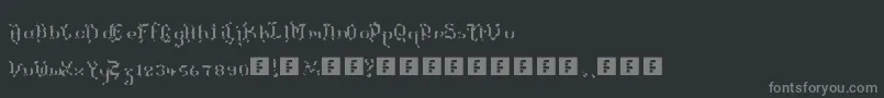 TheTerrifficKerganogggg-Schriftart – Graue Schriften auf schwarzem Hintergrund