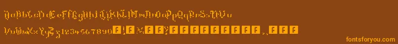 フォントTheTerrifficKerganogggg – オレンジ色の文字が茶色の背景にあります。