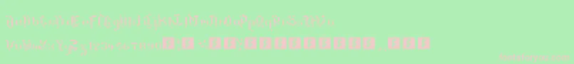 TheTerrifficKerganogggg-fontti – vaaleanpunaiset fontit vihreällä taustalla