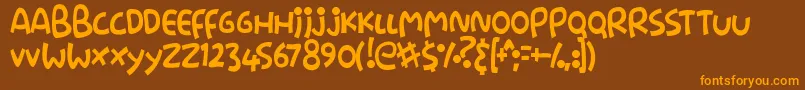 フォントStringz – オレンジ色の文字が茶色の背景にあります。