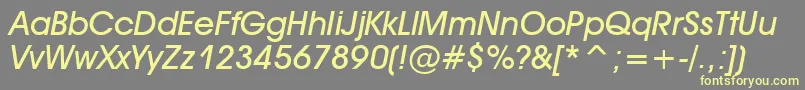 AvantGardeMediumItalic Font – Yellow Fonts on Gray Background