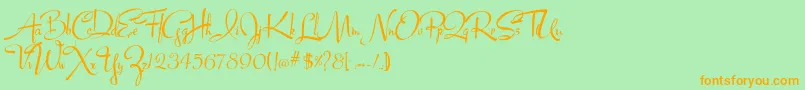 Lucyscript Font – Orange Fonts on Green Background