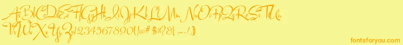 Lucyscript Font – Orange Fonts on Yellow Background
