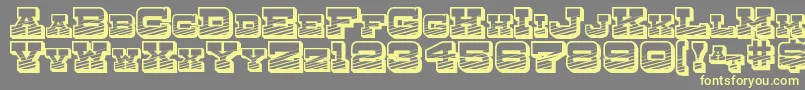 Шрифт DryGoodsEmporiumSmcJl – жёлтые шрифты на сером фоне
