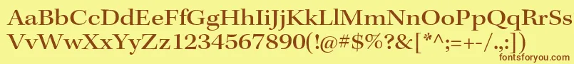 フォントKeplerstdMediumextsubh – 茶色の文字が黄色の背景にあります。