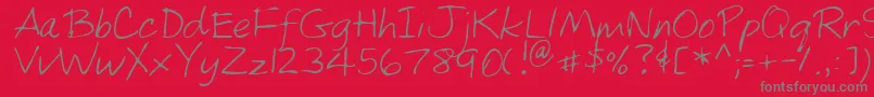 MarshRegular-Schriftart – Graue Schriften auf rotem Hintergrund