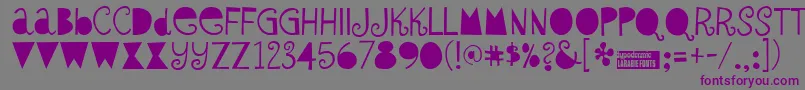 Sybig-fontti – violetit fontit harmaalla taustalla