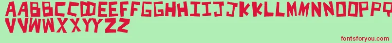CutItOut Font – Red Fonts on Green Background