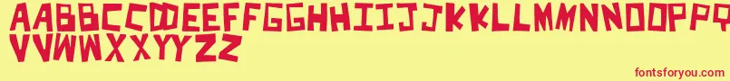 CutItOut Font – Red Fonts on Yellow Background