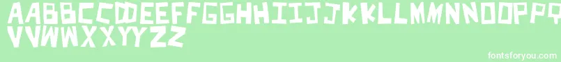 CutItOut Font – White Fonts on Green Background