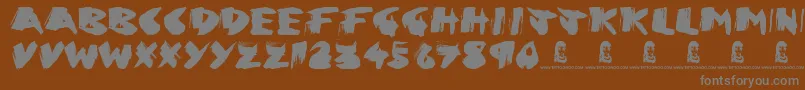 Greed Font – Gray Fonts on Brown Background