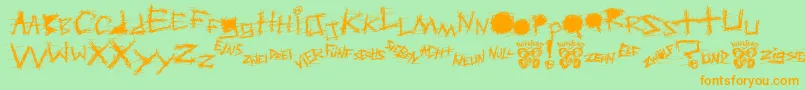 フォントAggressiveAngryBabyKiller – オレンジの文字が緑の背景にあります。