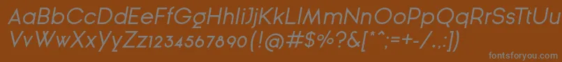 フォントGinРІraSansOblique – 茶色の背景に灰色の文字