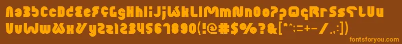 XtremeBike-Schriftart – Orangefarbene Schriften auf braunem Hintergrund