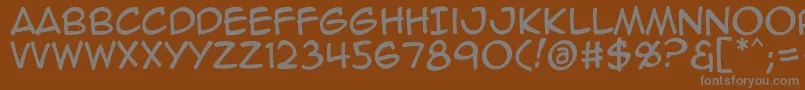 Animeace2Reg-fontti – harmaat kirjasimet ruskealla taustalla