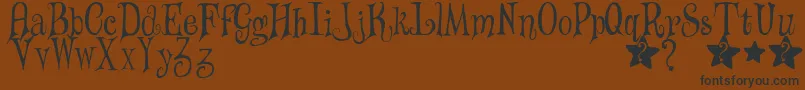 WizardsMagic Font – Black Fonts on Brown Background