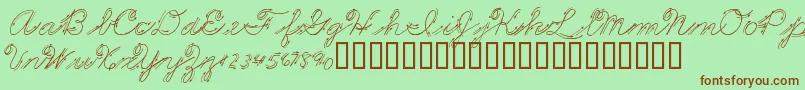 PremiersMotsScript-Schriftart – Braune Schriften auf grünem Hintergrund