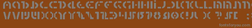 Quest2l-fontti – harmaat kirjasimet ruskealla taustalla