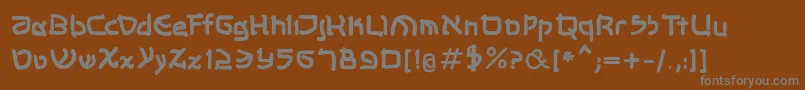 フォントShalommkbold – 茶色の背景に灰色の文字
