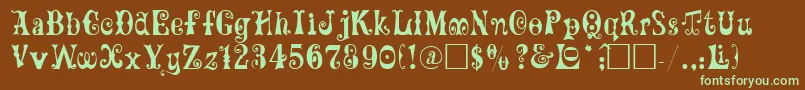 フォントMaxcircu – 緑色の文字が茶色の背景にあります。