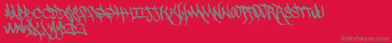Czcionka Scrawl3rd – szare czcionki na czerwonym tle