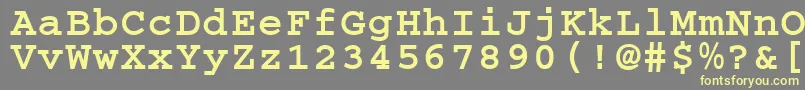 フォントCougelBold.001.001 – 黄色のフォント、灰色の背景