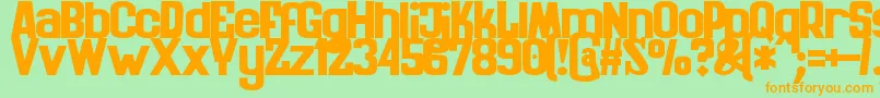 フォントZaiKinematografiapolska1908solid – オレンジの文字が緑の背景にあります。